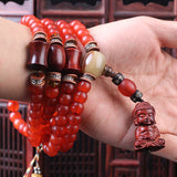 Red horns and prayer beads bracelet