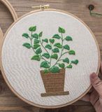 Cross stitch of green plants