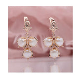 Ladies Flame Rose Gold Shell Pearl Earrings - Nioor